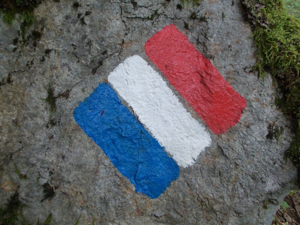 Francouzská vlajka, která značí hranice národního parku