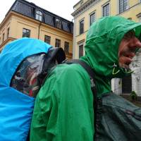 Popis: Deštivá prohlídka Stockholmu
